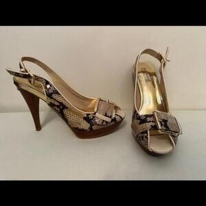 Step up your shoe game with Michael Kors' stunning snakeskin heels